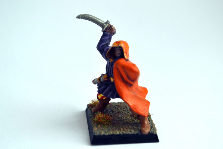 I also wanted to keep the cape, I did the orange way back when but my partner played around with the little bit of freehand kind of flame effecct on the hood so I wanted it to stay. the stripey trews are new though, I'm pleased with them in spite of the camera.