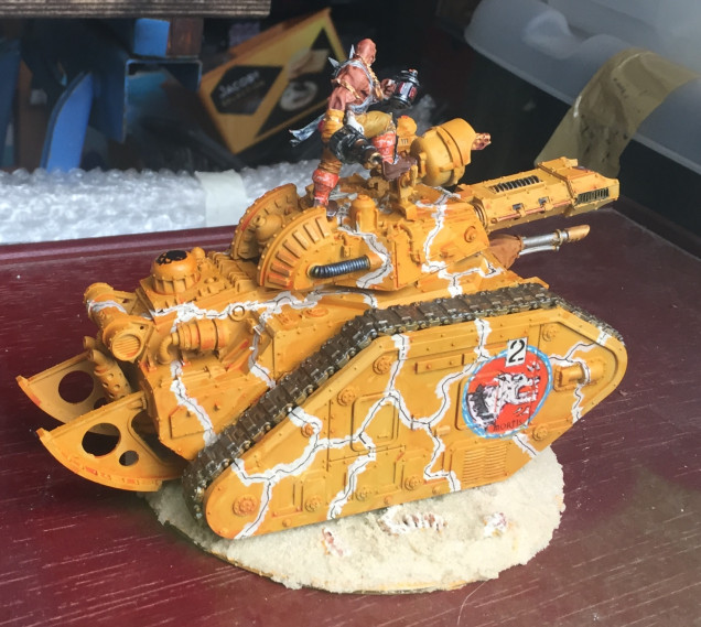 Leman Russ Incinerator based. Weathering by adding sand and metal chips will be applied when all the tanks come together. I also want to add a little lizard to the tank base to link with the native desert beasts that roam on Mubraxis and are used as mounts by the Rough Riders.