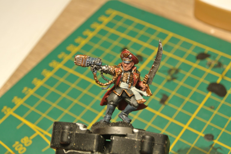 Basecoat the skin and the reds