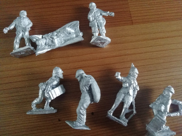 Some redoubt miniatures of soldiers building the barricades