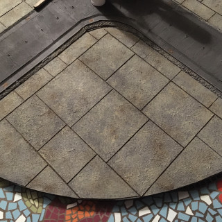 Pin Washing the tile gaps.