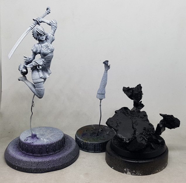 Cyber Beauty by Klukva, to be painted in 3 separate parts.  That base was a PITA to figure out how it goes together.  Anyone got any good guides for how to paint black stockings or white hair?