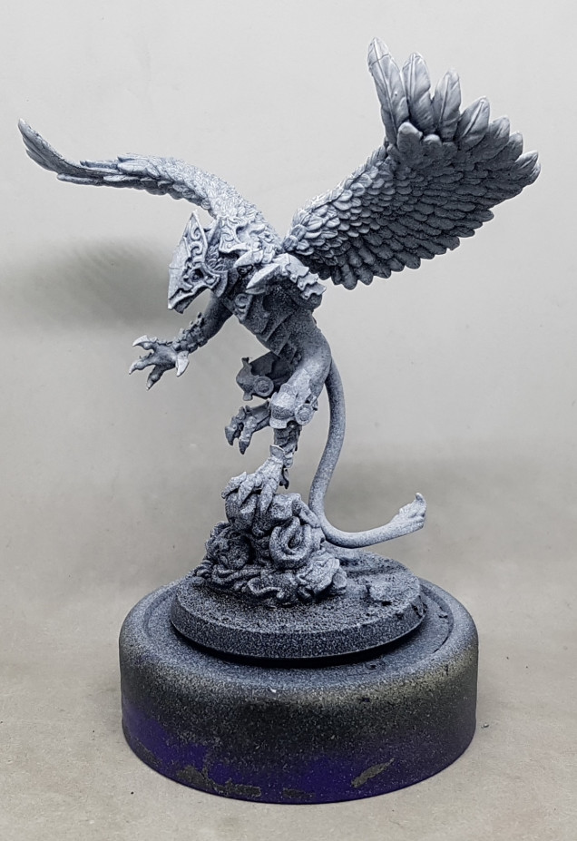 Kerub the Armoured Griffin by Legends of Signum.  That tail is supposed to rest flat on the base.  Its flat on the underside.  Thats one hell of a miscast