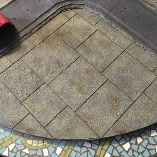Pin Washing the tile gaps.