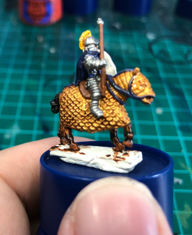 More base colours and then shading. (Retributor Armour shaded with Reikland Fleshshade, Lead Belcher armour and  blues and reds on strapping of horses and browns on saddles all shaded with Nuln Oil)