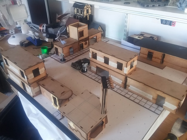 Laser cutting mdf buildings is far quicker than decorating them