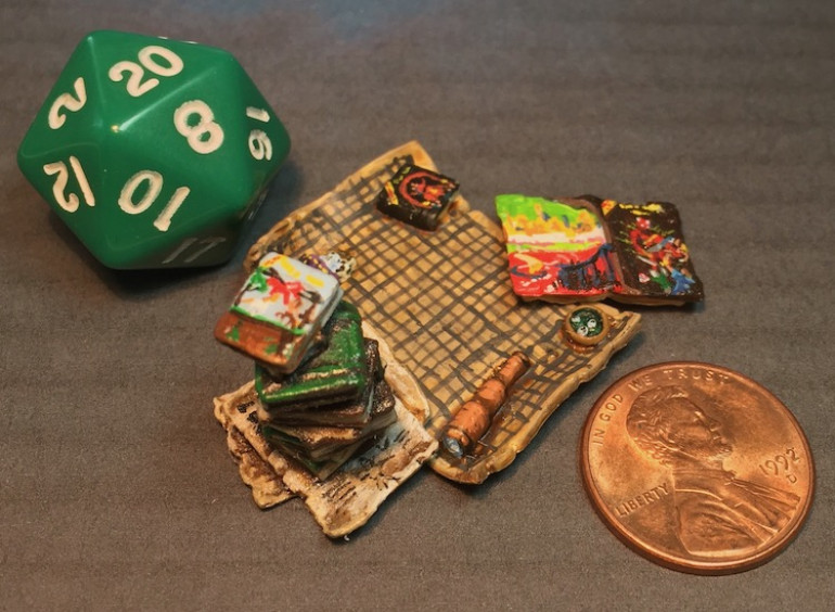 It was pointed out that I needed a shot showing scale so here are a d20 and a US penny to help with that.