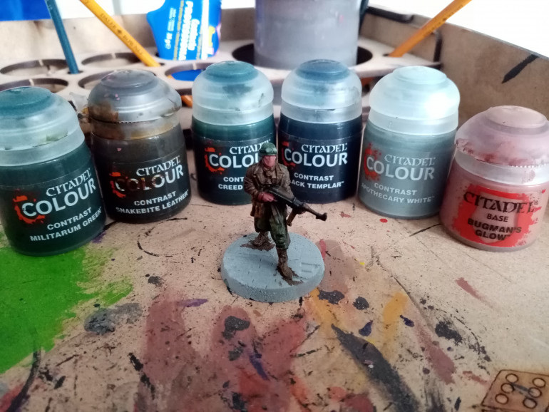 I am painting my soldiers with the paints: contrast militarum green, contrast snakebite leather, contrast creed camo, contrast black templar, contrast apothecary white and bugman's glow