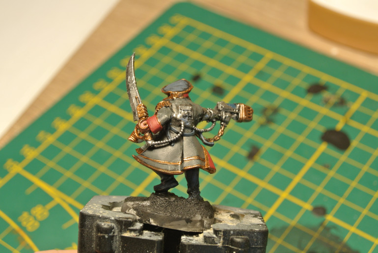 Basecoat the skin and the reds