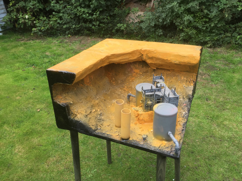 Display board WIP - plaster, paint and sand everywhere!