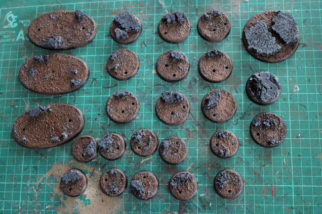 The rocks were firstly drybrushed with Mechanicus standard grey 