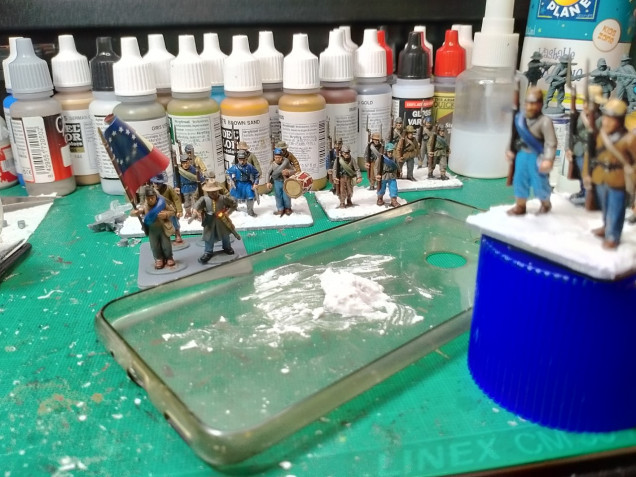 The bases are 40mmx40mm, 4 models per square, 24 in the full regiment.