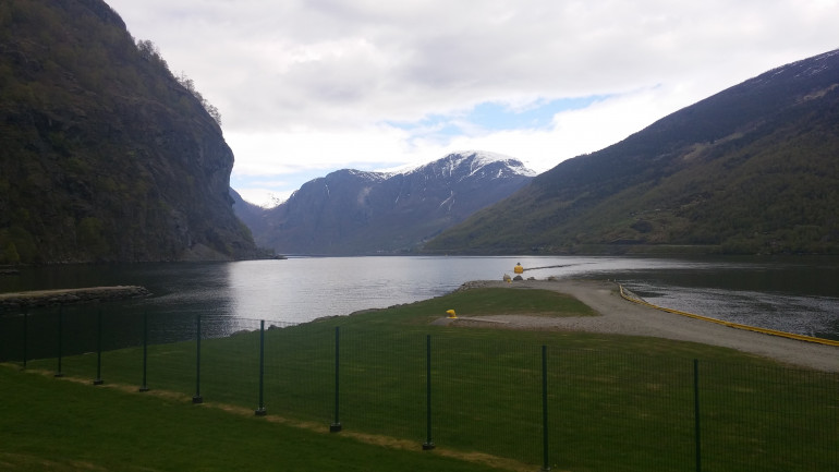 This is from the dock at Flåm and is pretty much at the starting point of the fjord, proper. The shape of the valley here is typical of the U-shaped valleys that almost define a glacial valley. Over time, erosion does smooth out the slopes, but they are generally very steep.