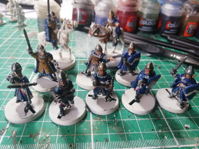 A bit more work on the blue robes of the Norman guards. Mix of contrast and conventional paints