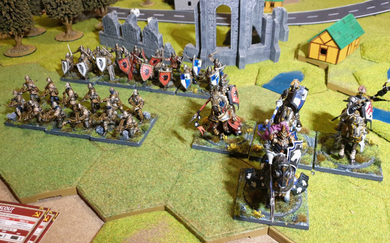 Ist a close up last 4 men at arms White and Blue Knight