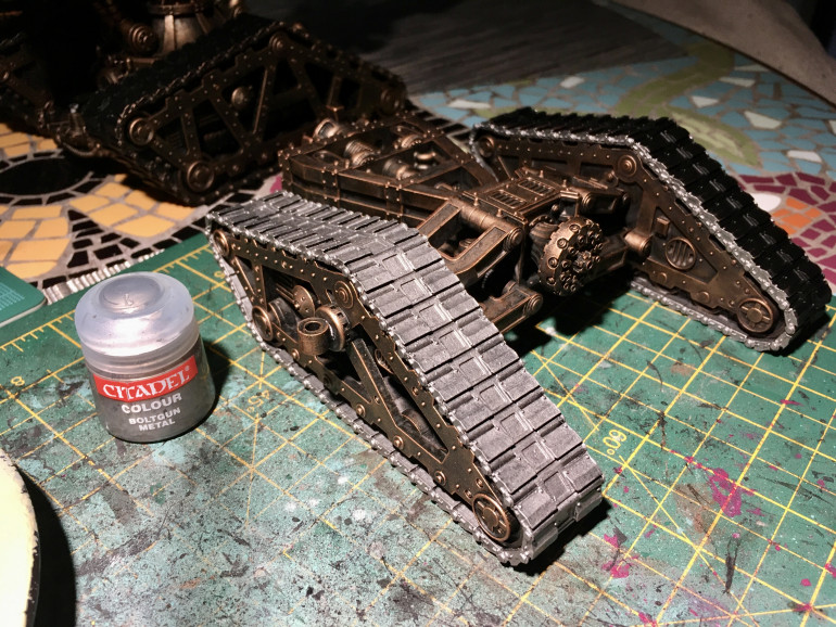 Getting the base colour on the tracks and weapons before the wash. Using the last few drops of my pot of boltgun metal.