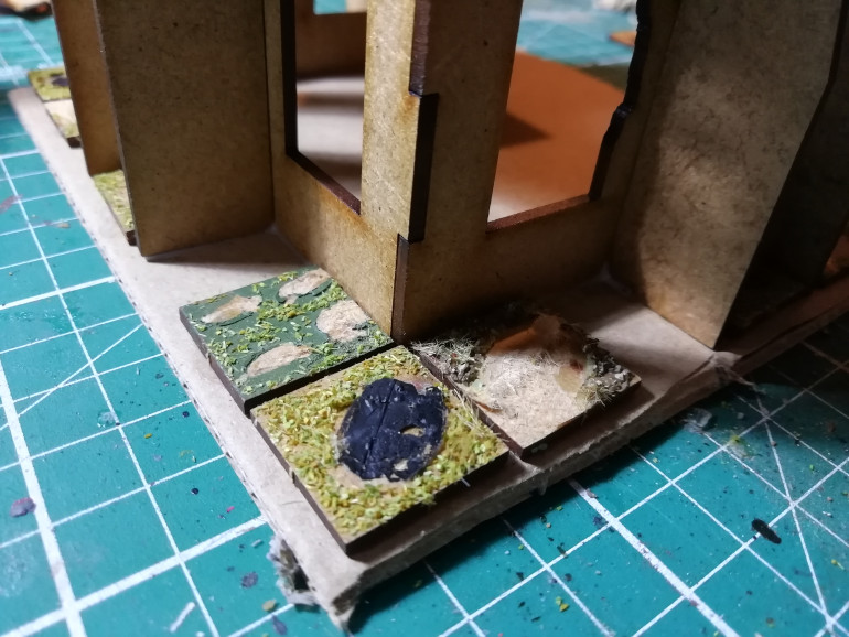 I based each building and used some old square mini stands for pavement before adding rubble piles