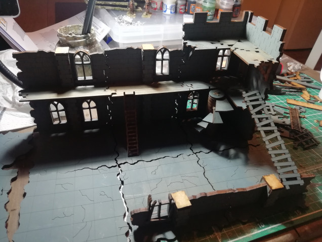 The second set of ruins gives me a large area if building going up a couple of floors and accessories such as ladders and walkways. This time I sprayed the kit a base colour before popping them from the Frames