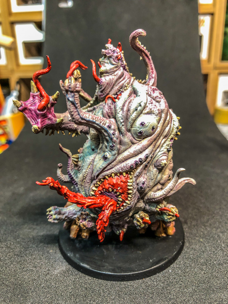 Yog Sothoth. This was a really fun and bizarre miniature to paint as it has no real from or back and mandated that I play with mixes and gradients of contrast paint to escape a monotonous blob of a body.  I touched up the many eyes with gloss varnish.