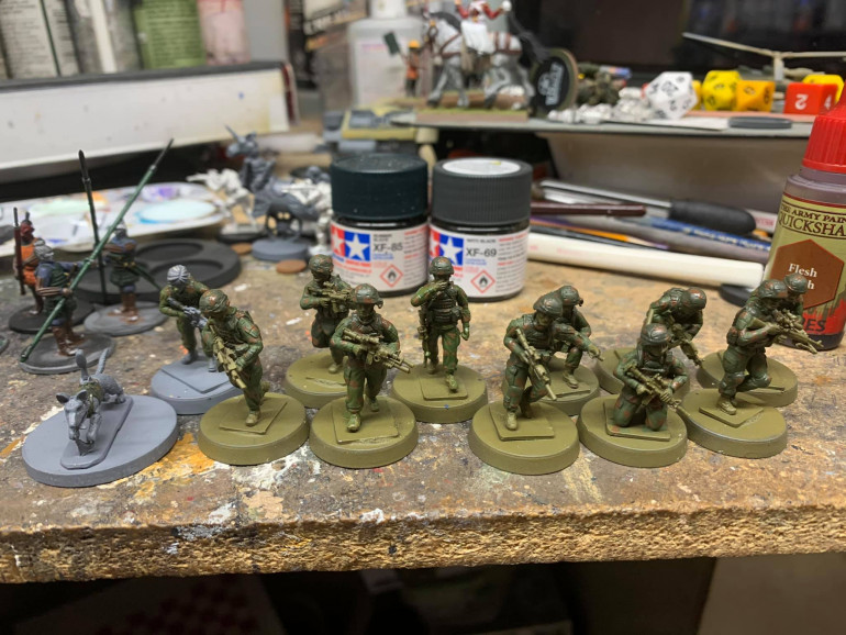 I do better if I have a physical model to move around as I prepare for play testing. These are Empress Miniatures from their MODERN US DEAL 1 US1, 2, 3, 4 set. They are acting as a proxy for my Narration Army Infantry Squad. I also made an order to Eureka for their JGSDF minis and it came with a dog. So the dog handler's head is from statuesque miniatures.