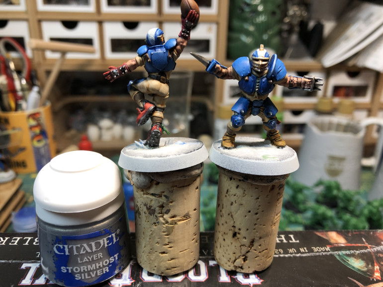 Steel and golden metallic areas are highlighted with Stormhost silver, mainly as edge highlights.