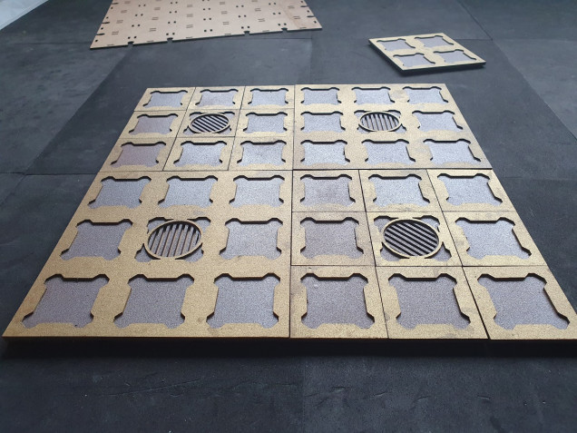 All the tiles fit together onto a base board....