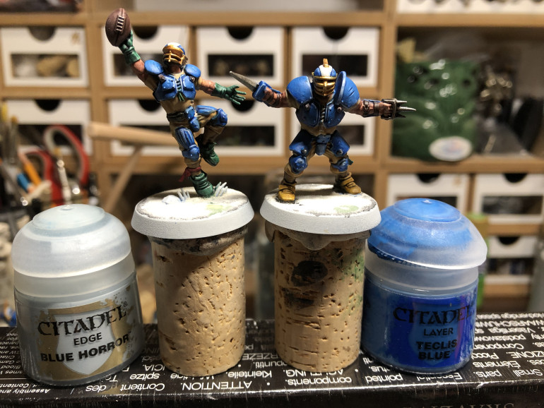 The armor was then highlighted with Teclis Blue and edged with Blue Horror