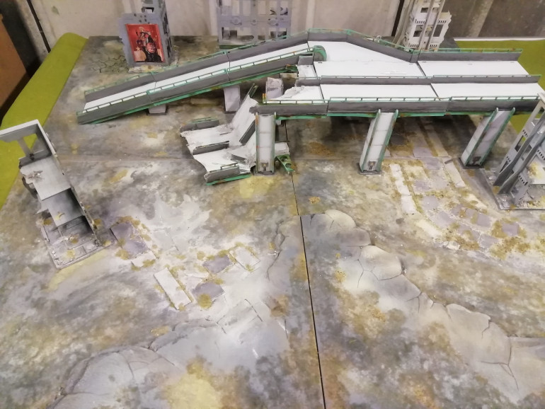 I've rusted up some sections. Now it's on the board I'm thinking of making some ramshackle raiders camp to go on top.