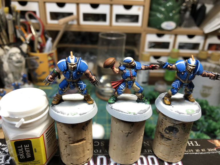 Finally, stripes are painted using white. Uses a small, long hair brush to do so, making certain to apply paint thin enough to flow effortlessly. Touch one hand to another so as to lower the effects of shaking.