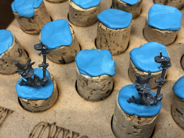 First, despite their size, several of the miniatures cried for pinning, as I am am rather adverse to performing miniature surgery in the midst of a game. The stilt walkers are but one example of the players I had to pin to their base for more sturdiness.