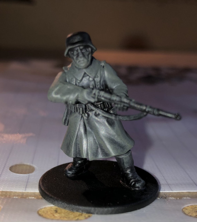 2. Next, I  liberally dry brush the uniform with German Fieldgrey. I also hit the webbing and boots slightly.