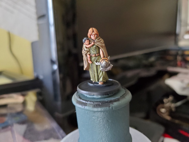 Went with fairly drab, earthy colours to represent an average woman who may be scouring a battlefield in search of her husband or just a local Briton working around a Roman fort.