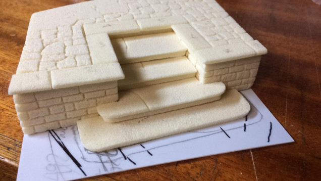 Happy with the elements and placements, its time for a little refinement work  - With hobby files I sanded into some details: lips for the steps and some stepped coving on the wall ruins. I also sculpted the inset edge panels that go around the wall and the steps recess. 