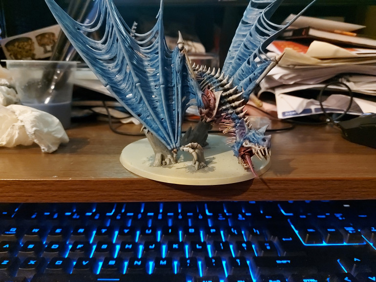 please forgive the untidy desk, first Warhammer mini painted in a good number of years. still needs basing but i think I can play with this standard