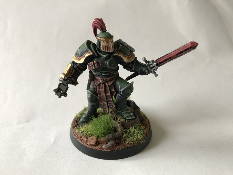 The first of the two knights, armed with a primitive bolt gun of some sort, a chainsword, and wearing power armour, all as per the GW lore.