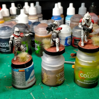 In a store far away hobbyists paint tiny fighting men - OTT Christmas 2019