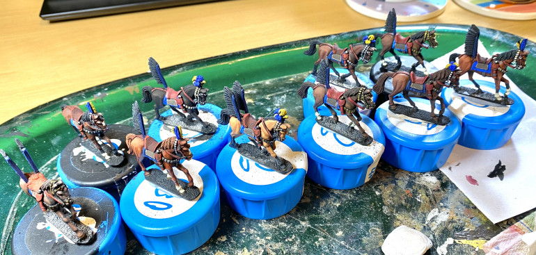 Riderless horses ready for varnishing