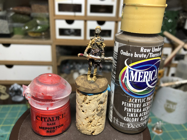 Finishing the color blocking, I chose a red color for weapon handles and a craft paint brown for the bases (so as not to clash too much with the boards).