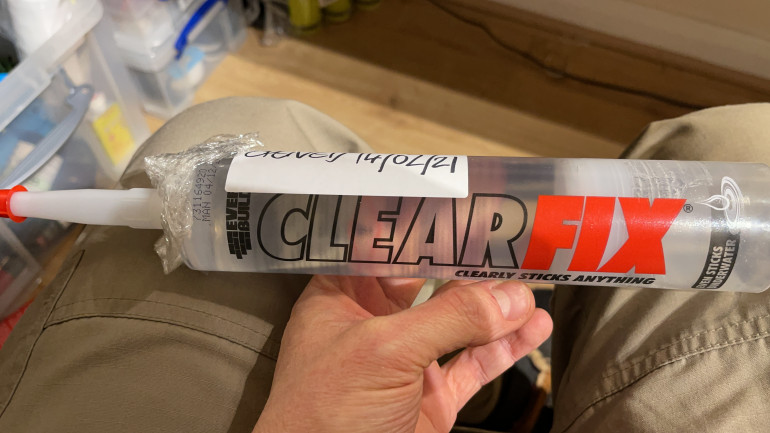 Clear Fix sealant (note, its not normal silicon caulking)