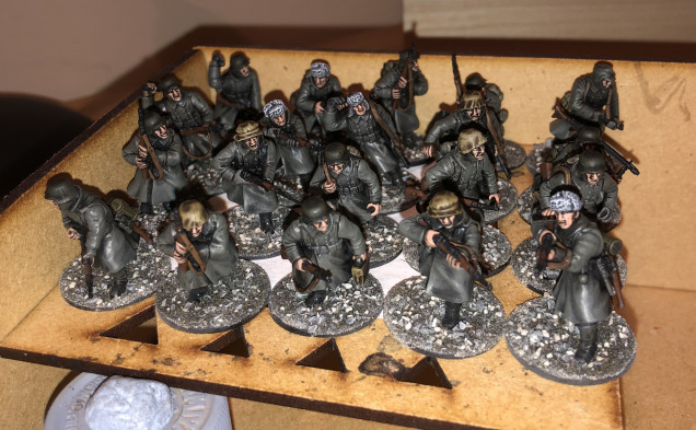 I have now painted ALL of the German infantry and I have begun to base them with my rubble mix! Here’s a few of them drying off... 