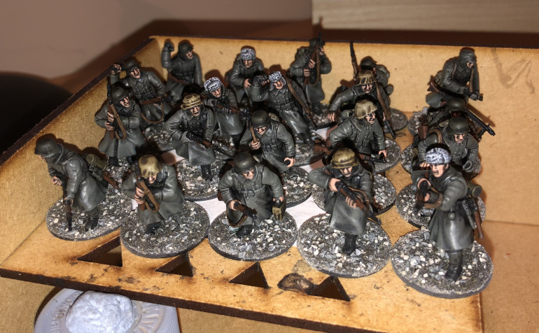 I have now painted ALL of the German infantry and I have begun to base them with my rubble mix! Here’s a few of them drying off...