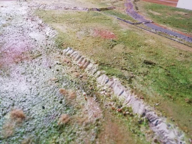 Today I have done two boards together as they both contain the same hill with s little track crossing it. I want to put a Zulu village on this one