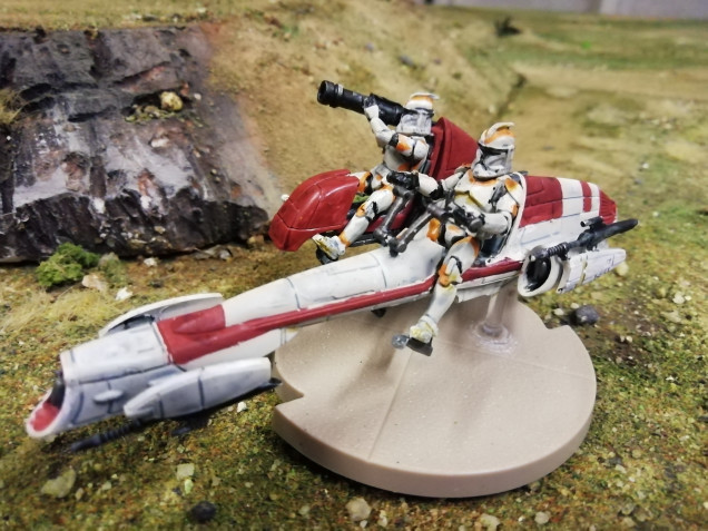 I've added the orange markings to the clone troopers and after a little research found that the vehicles are still red despite the battalion colours.