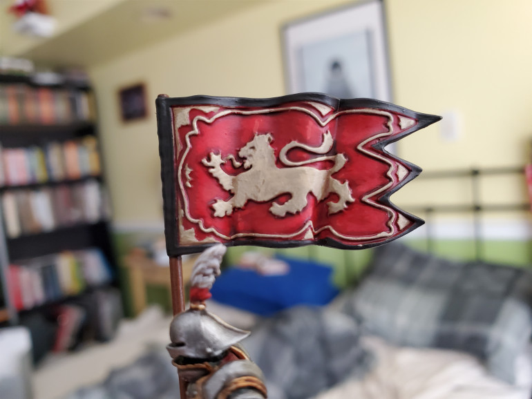 Having issues posting groups of images...so this will have to do for now. Much the same process on the lion and trim of the banner. For brightness I layered up with Ushabti Bone......