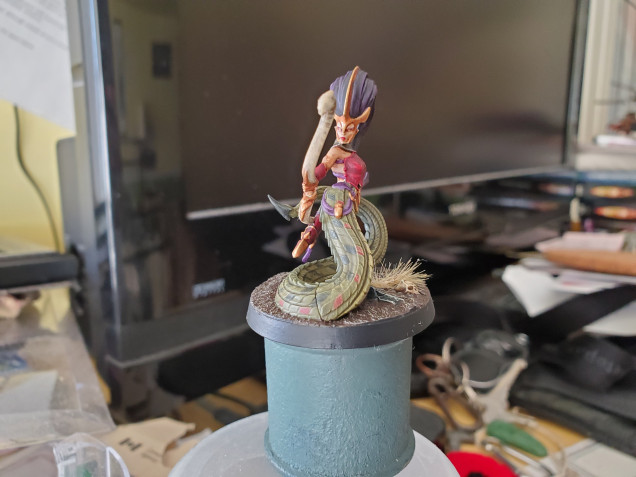 Tip for anyone who overdoes the starkness of highlights; glazes are your friend. Originally I had some VERY sharp lines between my shaded base colour and my highlight on the bow, but a nice glaze of my highlight colour smoothed it all out nicely. Also shades work quite nicely for eyeliner, if anyone is wondering.