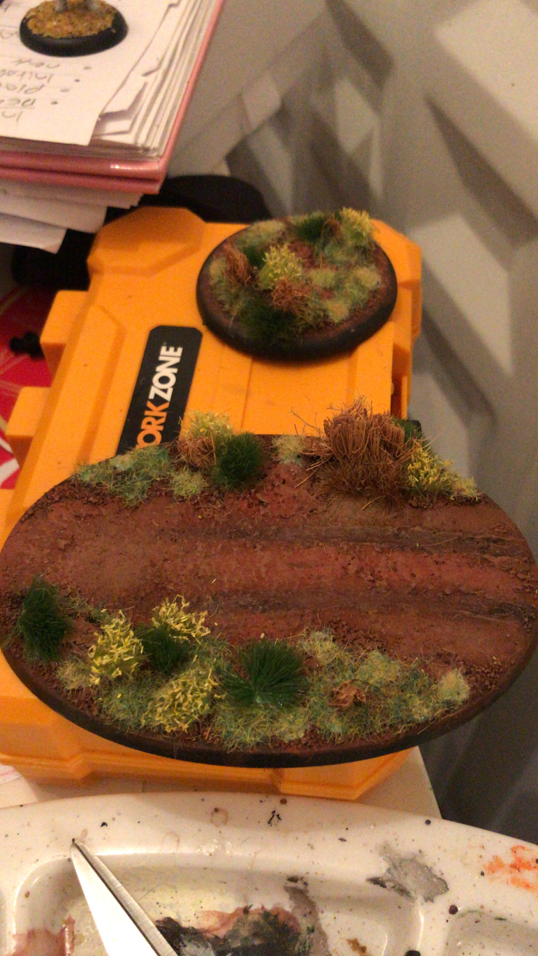I then glued on various tufts and made some bushes from an old chopped up door mat.