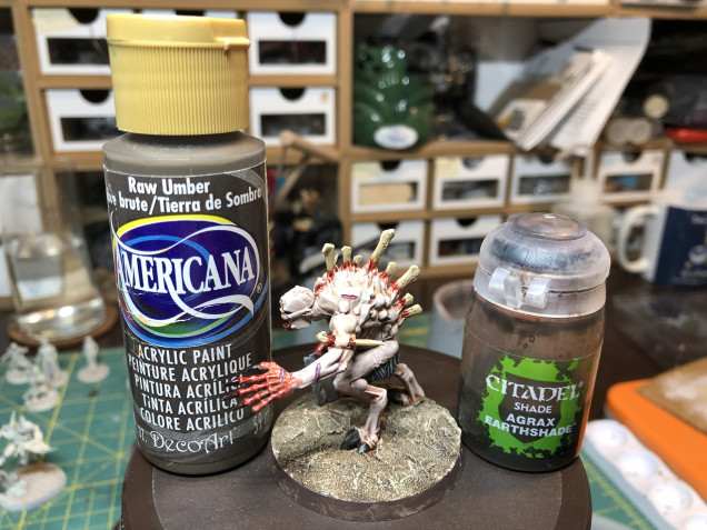 Basing is based in craft paint Raw Umber, washed with GW Agrax Earthshade. Leave the wash dry for a good 1/2 hour before applying the final dry-brush. 