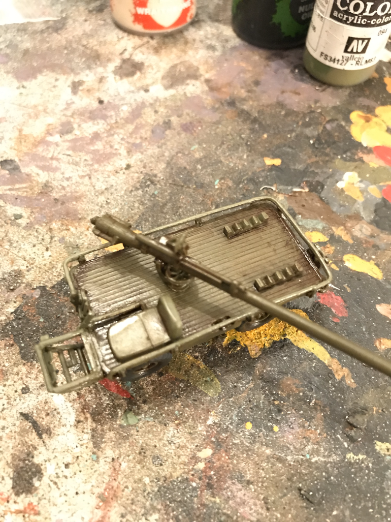 The model was undercoated with black primer then painted vallejo brown violate. The Mule was then highlighted with a mix of brown violate and vallejo russian uniform. The whole thing was then dipped into a 50/50 mix of agarx earth shade and nuln oil any excess was removed with a cotton bud to stop pooling.