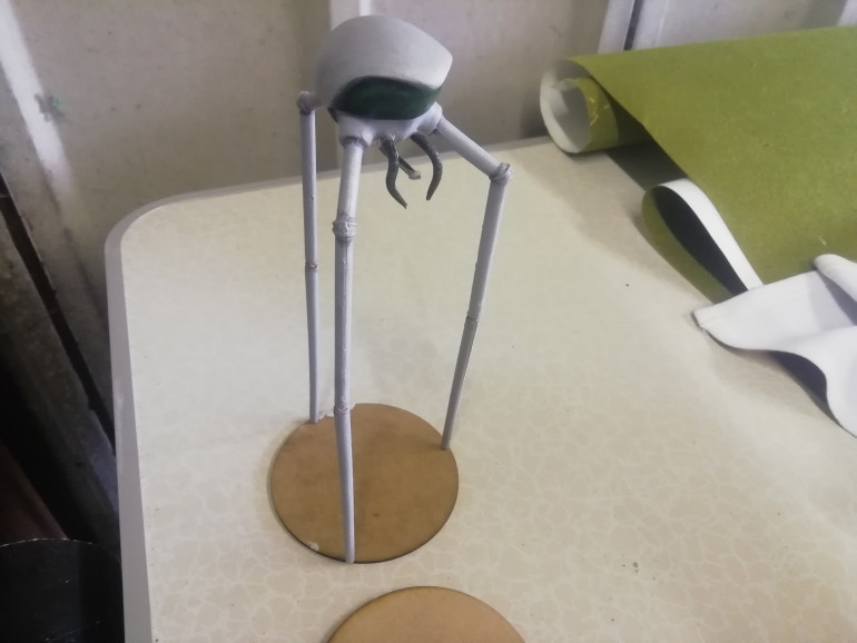The legs had to be glued back on as they come in two parts and very fidly. I decided to glue the legs to a stand to make it more secure. Hopefully he'll keep his three legs in this time