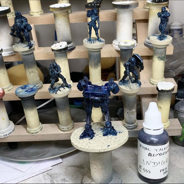 Slapped on Indigo all over. This colour will stain the primer and give a base for the wet on wet blending. There is some Prussian Blue on the mech because I had a brain fart at the beginning but it’s all fine as most is being removed anyway.